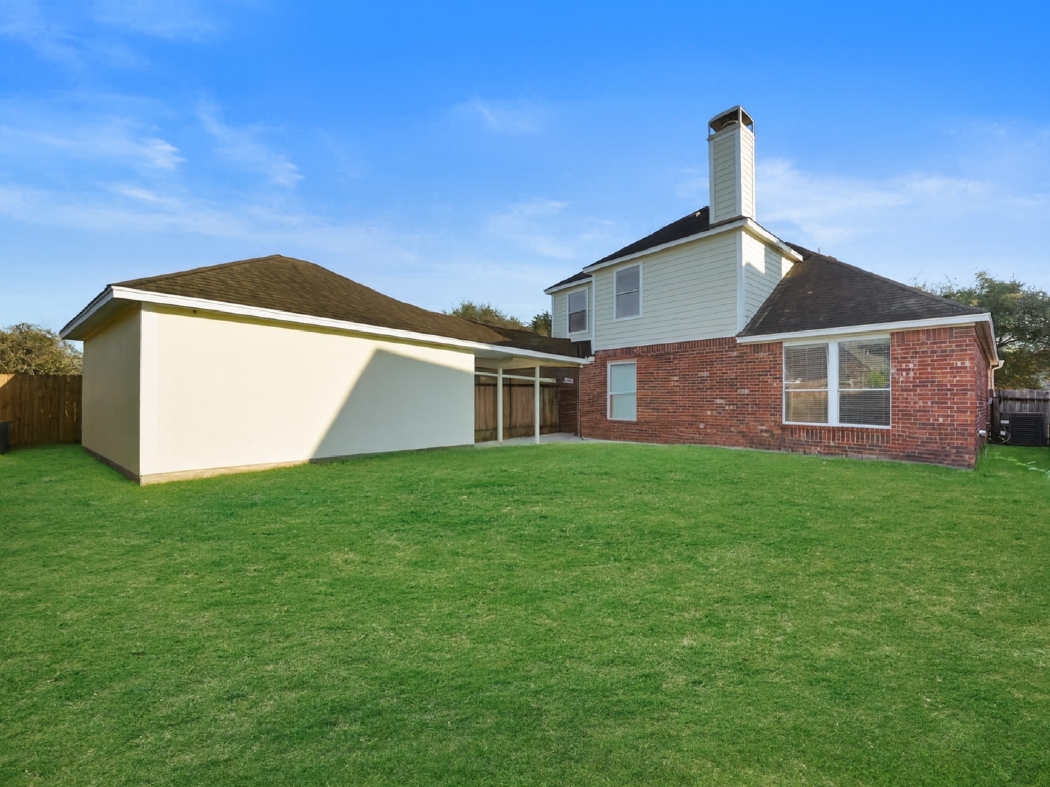 14206 Windy Ridge Lane Rosharon, TX 77583 - Photo 15 of 15 Expansive backyard with convenient access to a detached garage.