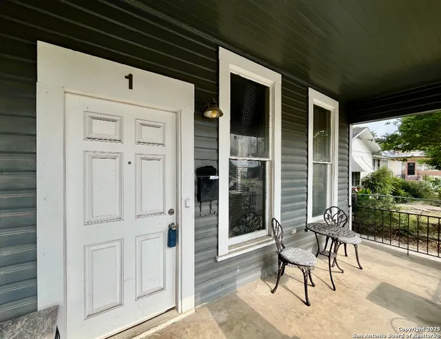 a front view of a house with patio