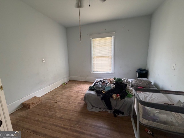 312 Grady Avenue Northeast Rome, GA 30161 - Photo 12 of 12 a bed room with furniture and a window