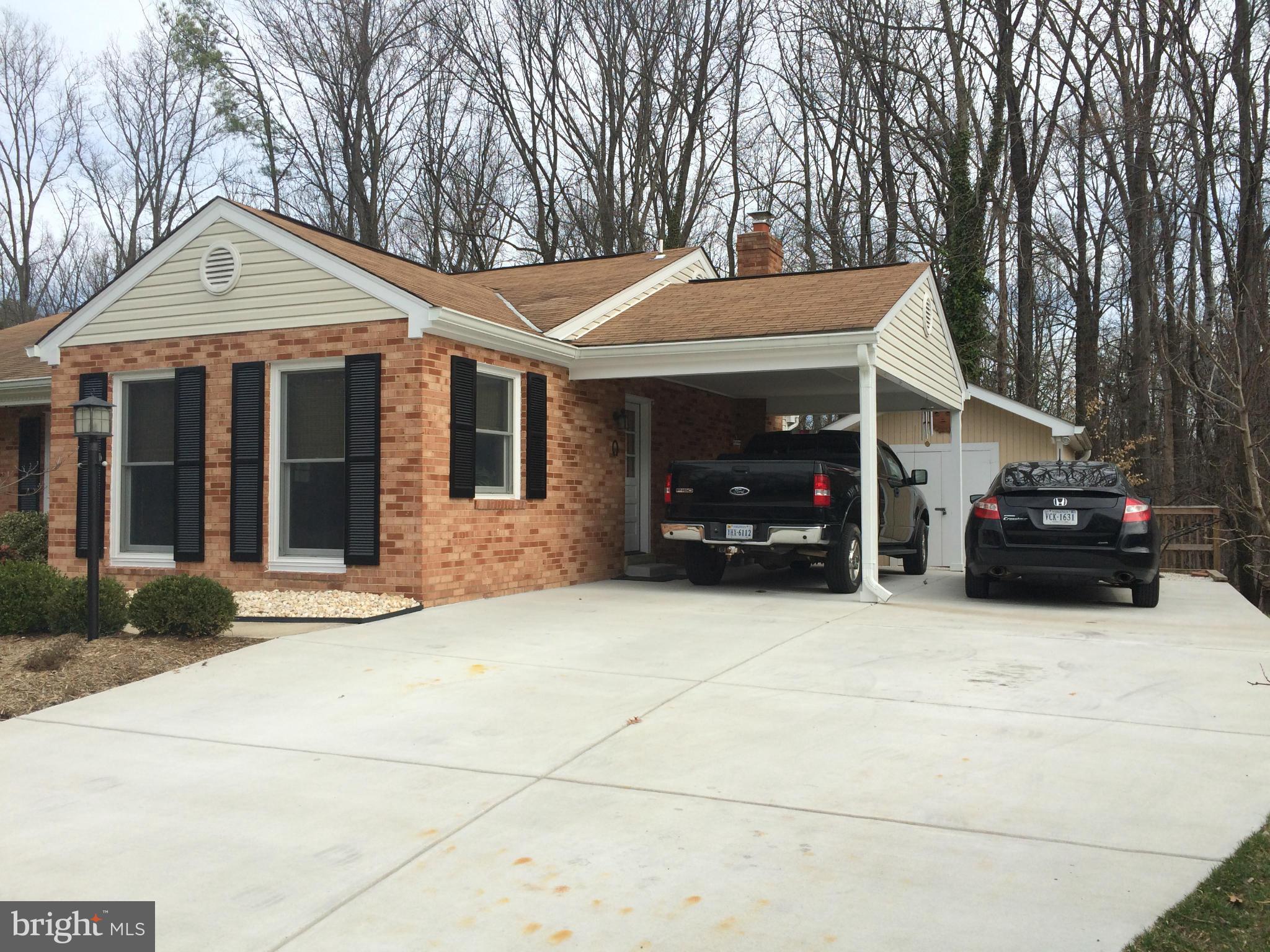 6131 Roxbury Avenue Springfield, VA 22152 - Photo 24 of 30 Driveway with Carport