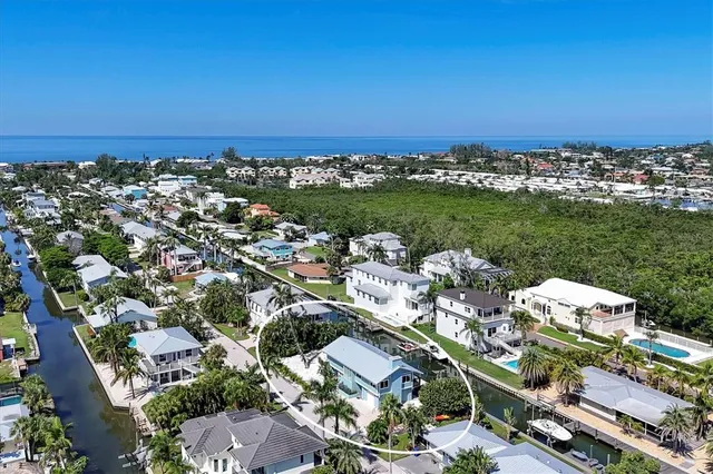 an aerial view of a city with lots of residential buildings