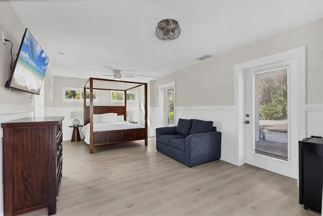 a living room with furniture and a window