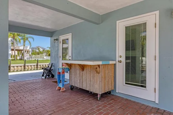 a view of balcony with outdoor seating and plants