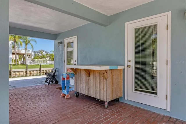 a view of balcony with outdoor seating and plants