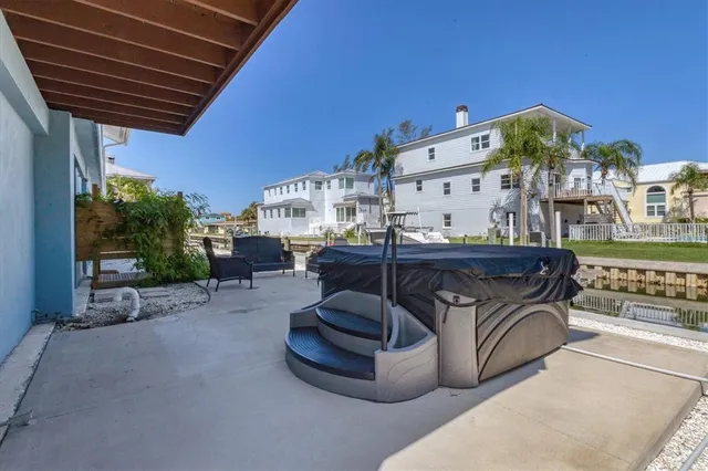 a view of a house with dining room and chairs