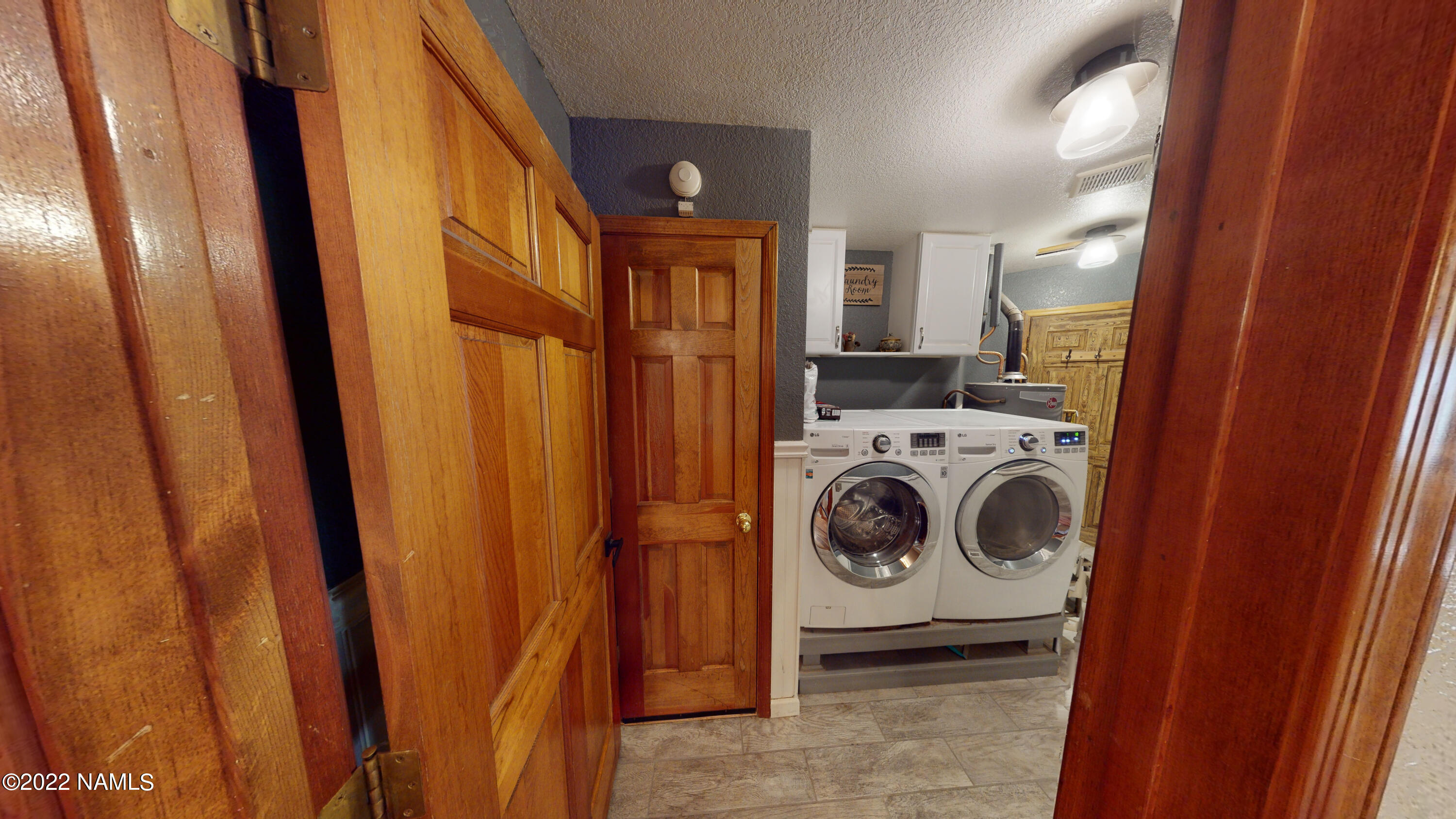12830 East Thunder Rdg Road Parks, AZ 86018 - Photo 33 of 97 a utility room with dryer and washer