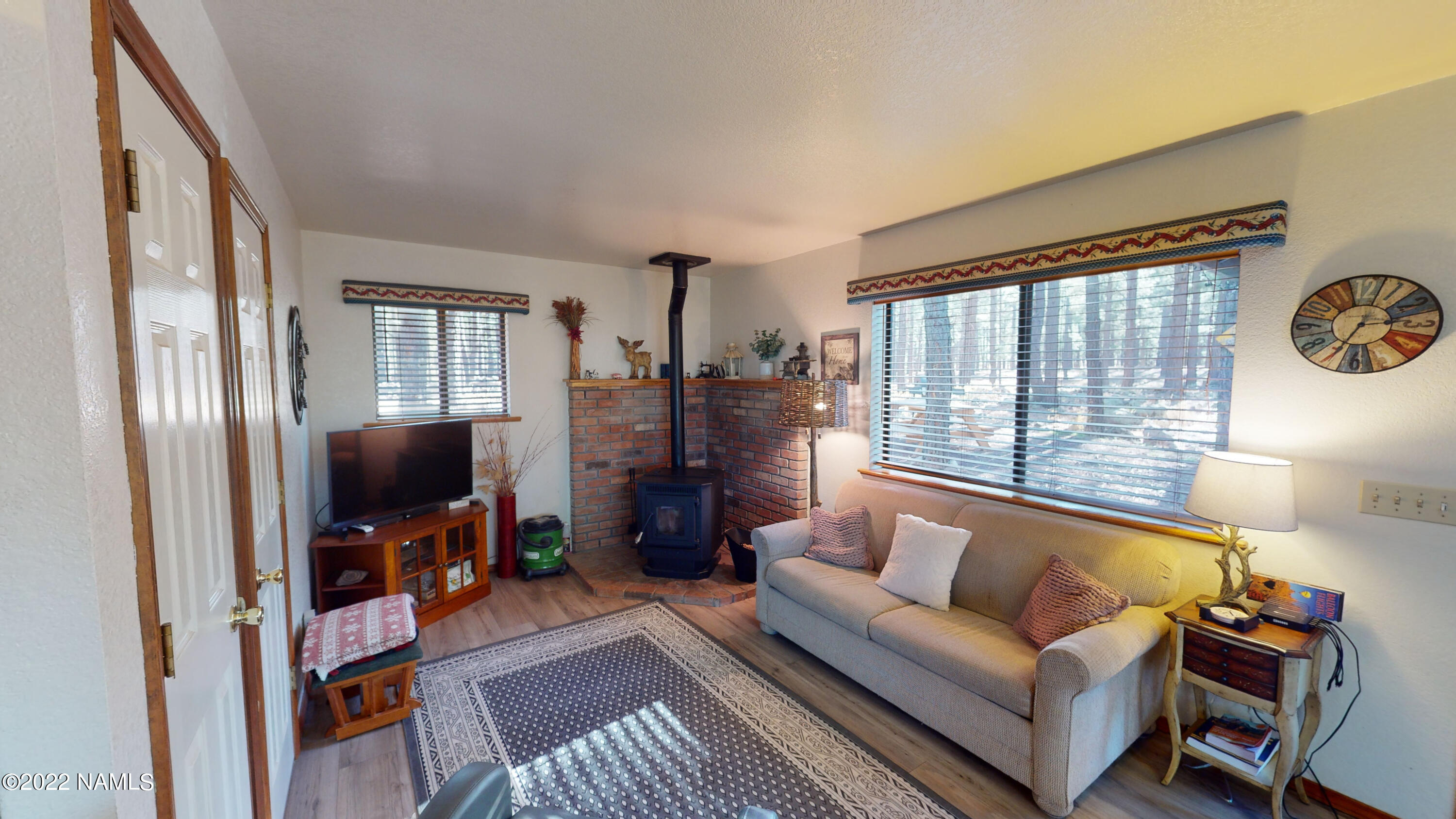 12830 East Thunder Rdg Road Parks, AZ 86018 - Photo 54 of 97 a living room with furniture and a flat screen tv