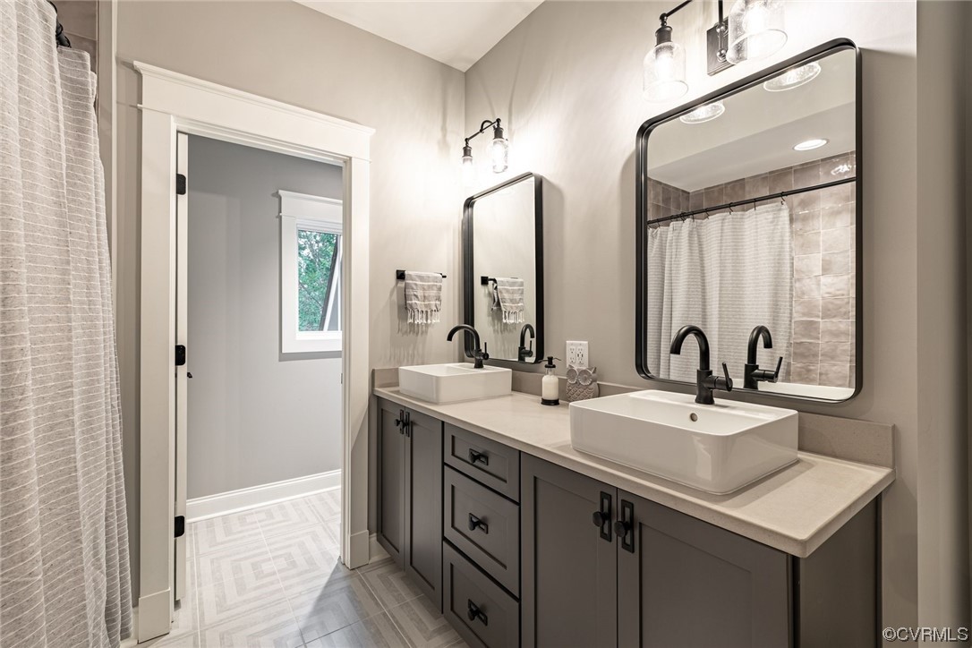 3508 Ormiston Grove Circle Henrico, VA 23233 - Photo 34 of 50 a bathroom with 2 sink and a mirror