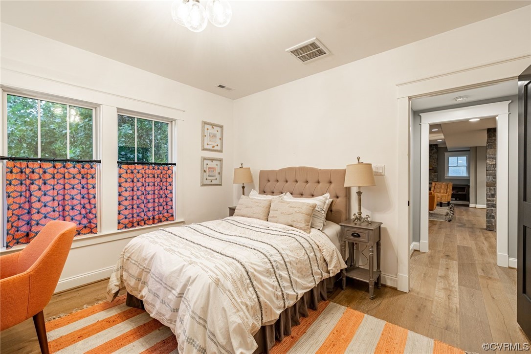 3508 Ormiston Grove Circle Henrico, VA 23233 - Photo 48 of 50 a bedroom with a bed a lamp and a large window