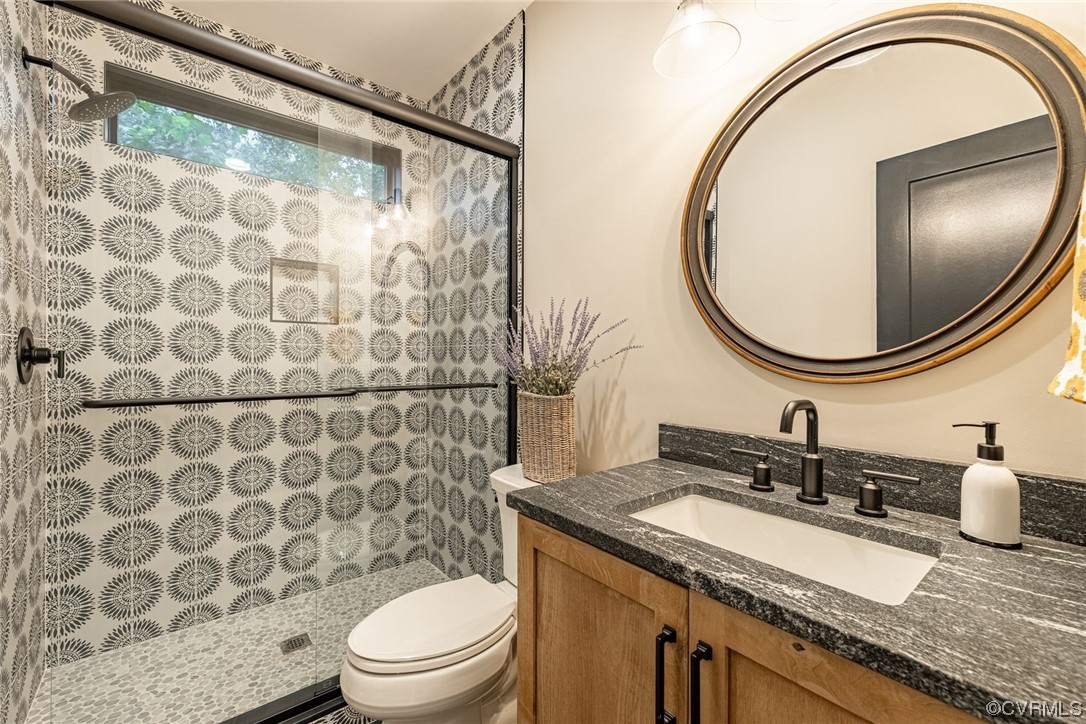3508 Ormiston Grove Circle Henrico, VA 23233 - Photo 49 of 50 a bathroom with a granite countertop sink and a mirror