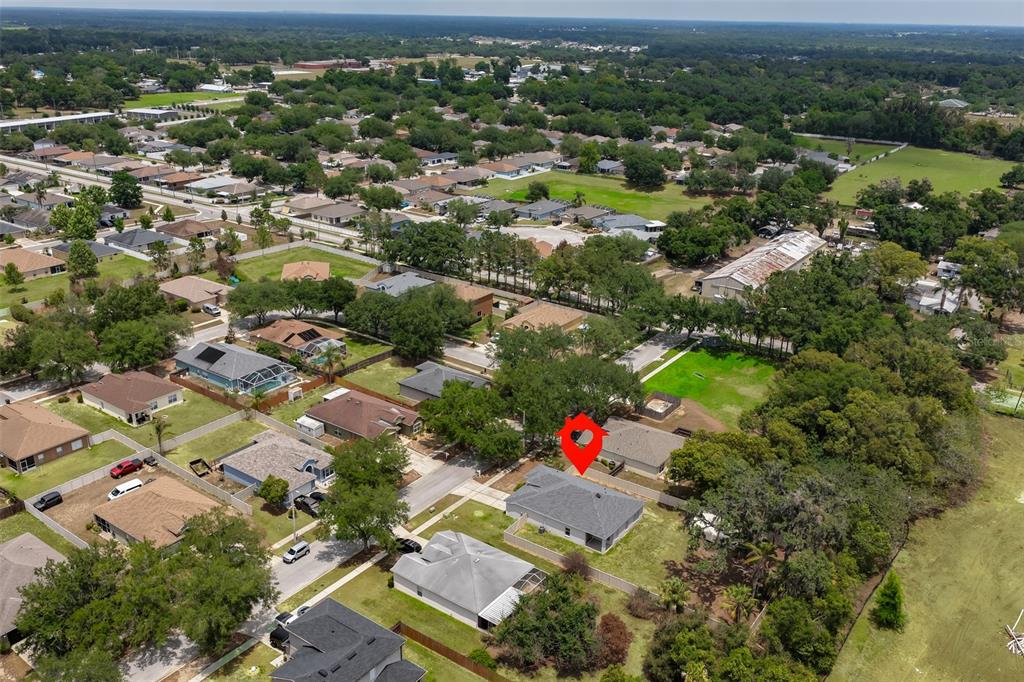 708 Coade Stone Drive Seffner, FL 33584 - Photo 45 of 48 an aerial view of residential houses with outdoor space