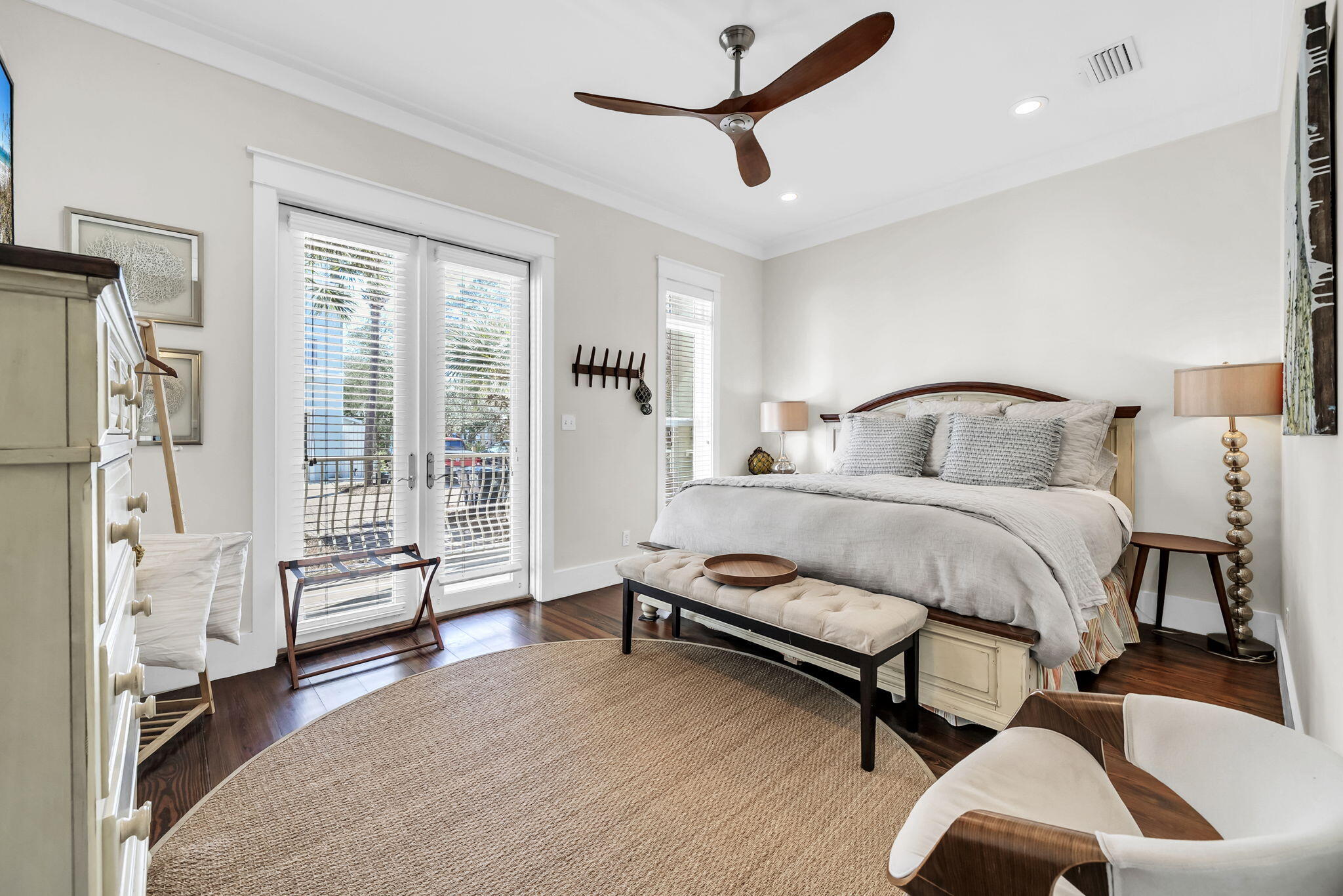 48 Cast Net Lane Seacrest, FL 32461 - Photo 8 of 41 a bedroom with a bed and a chair with the potted plant