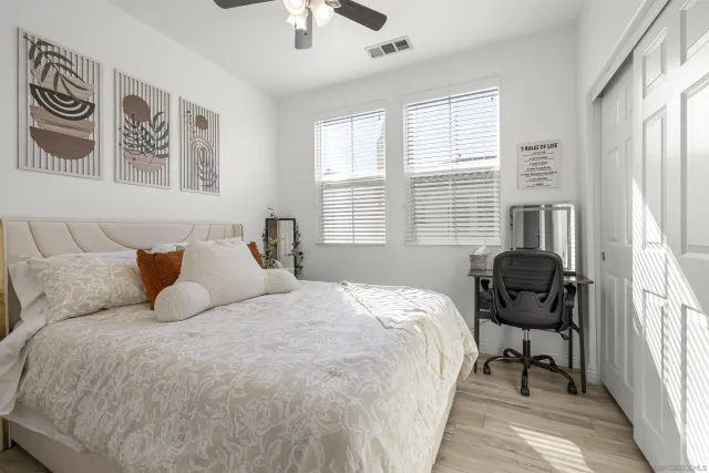 a balcony with furniture and a window