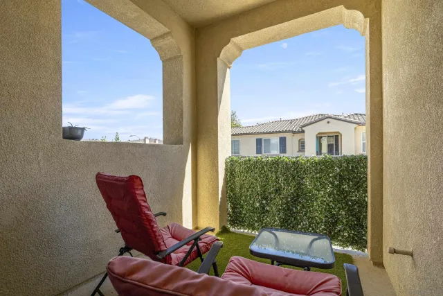 a view of a swimming pool with a patio
