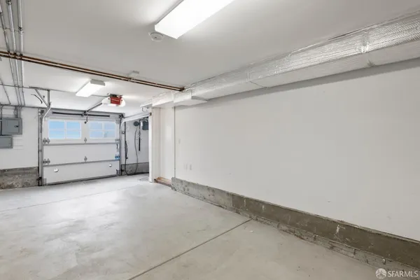 a view of a room with an empty space