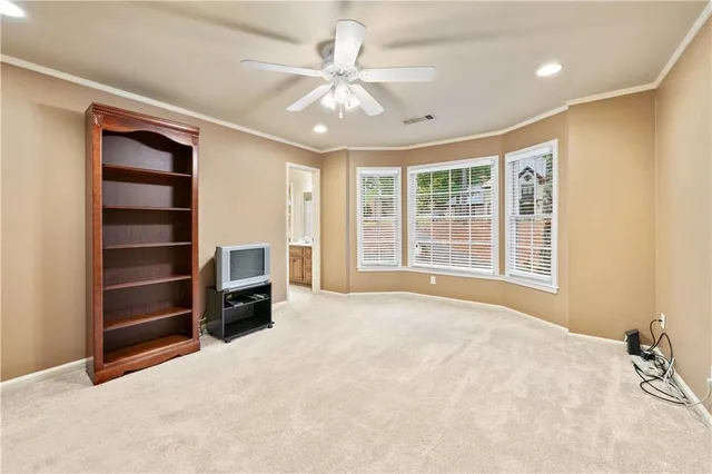 a view of a balcony with wooden floor