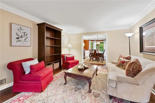 a kitchen with stainless steel appliances granite countertop a stove a microwave and cabinets