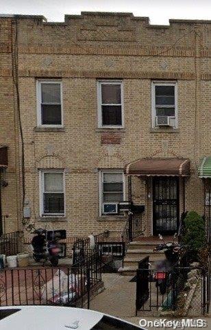 a front view of house with outdoor space