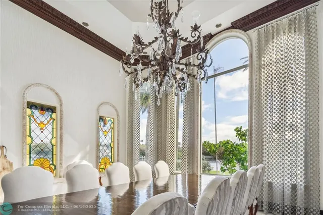 a front view of a house with outdoor seating