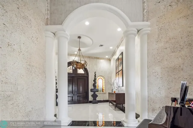 a view of living room and kitchen with furniture