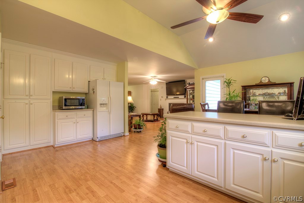 12607 Balta Road Chesterfield, VA 23838 - Photo 15 of 27 a large kitchen with cabinets and wooden floor