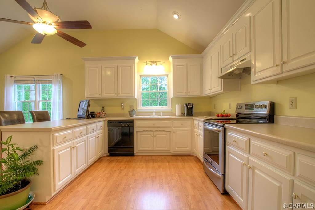 12607 Balta Road Chesterfield, VA 23838 - Photo 16 of 27 a kitchen with stainless steel appliances granite countertop a sink and cabinets