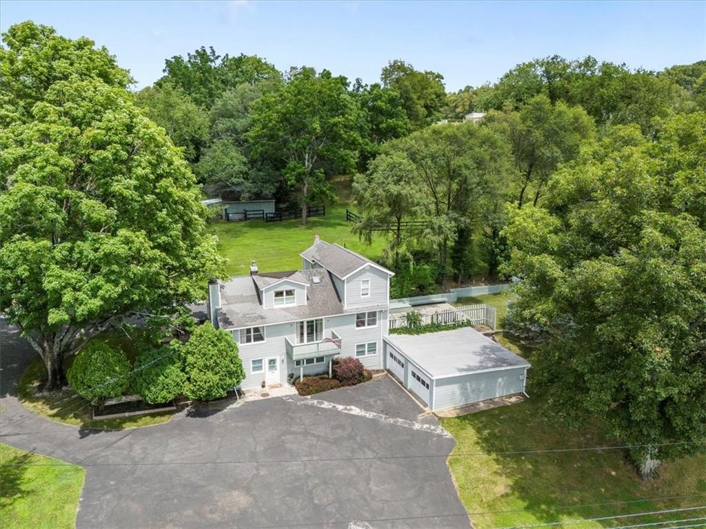 Gorgeous 3 family home on beautiful lot in Warwick School District -- a rarity!