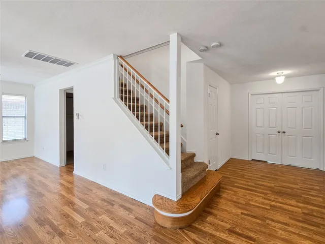 a view of entryway with wooden floor
