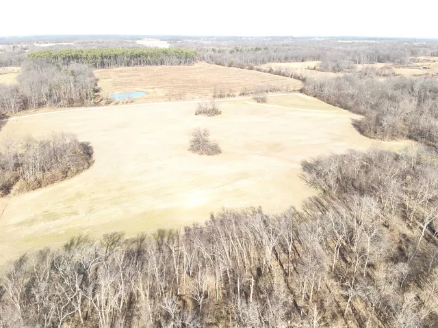 an empty room with a empty space and a window