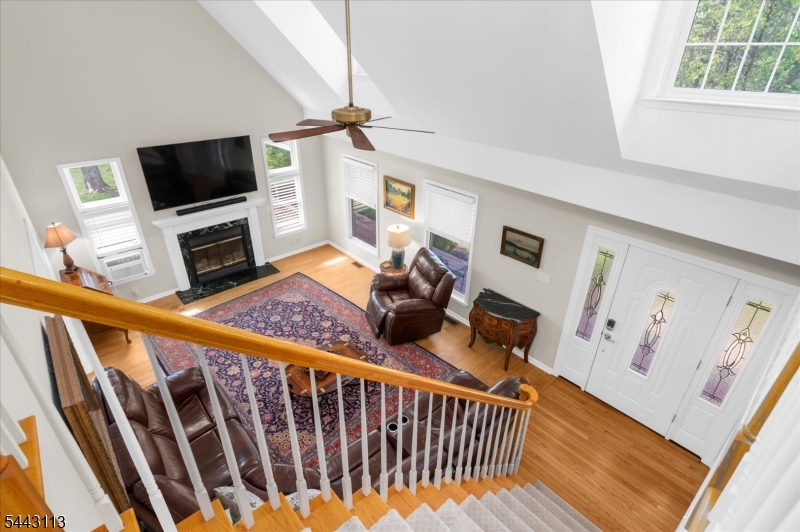 54 Rick Road Milford, NJ 08848 - Photo 19 of 50 a living room with furniture and a flat screen tv