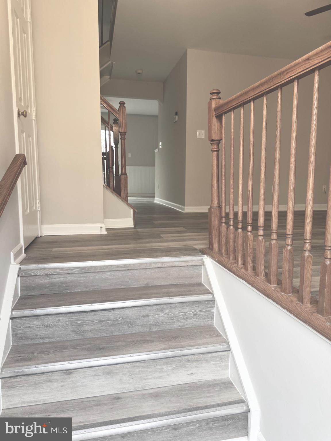 10630 Winfield Loop Manassas, VA 20109 - Photo 2 of 44 Inviting staircase to a bright entryway.