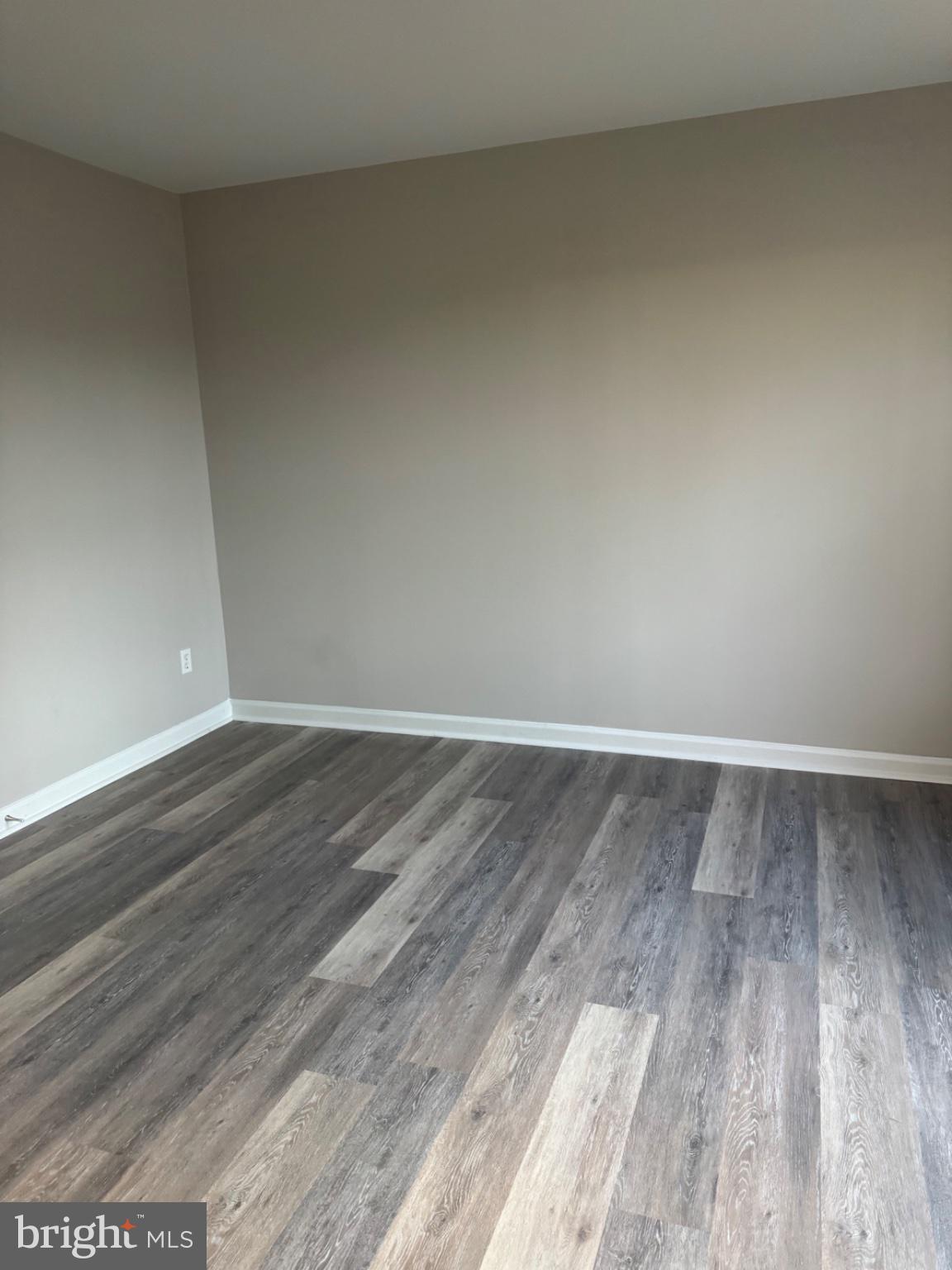 10630 Winfield Loop Manassas, VA 20109 - Photo 22 of 44 Spacious room with modern flooring.