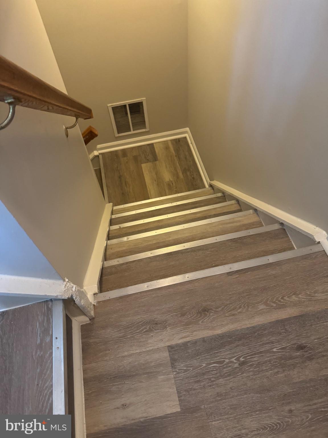 10630 Winfield Loop Manassas, VA 20109 - Photo 32 of 44 Inviting staircase to new beginnings.