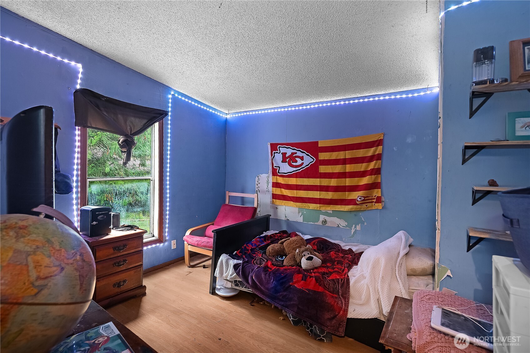 310 East Olde Lyme Road Shelton, WA 98584 - Photo 15 of 34 a bedroom with furniture and a large window