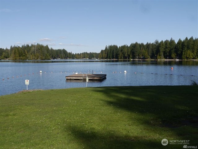 310 East Olde Lyme Road Shelton, WA 98584 - Photo 26 of 34 a view of a lake with a big yard