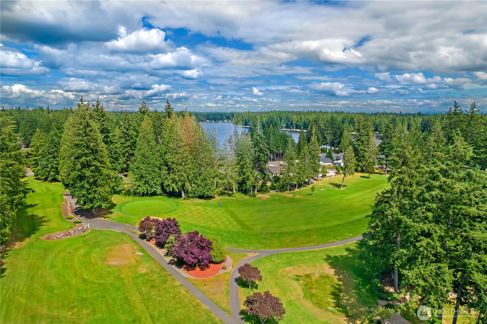 310 East Olde Lyme Road Shelton, WA 98584 - Photo 30 of 34 a view of a golf course with a garden