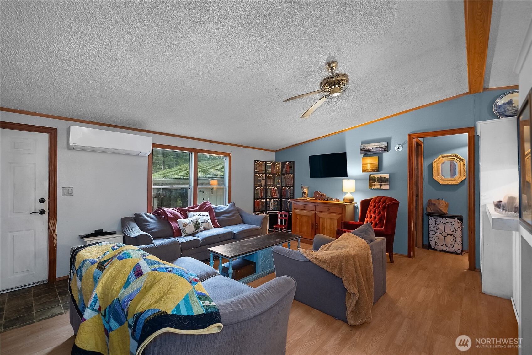 310 East Olde Lyme Road Shelton, WA 98584 - Photo 6 of 34 a living room with furniture fireplace and flat screen tv