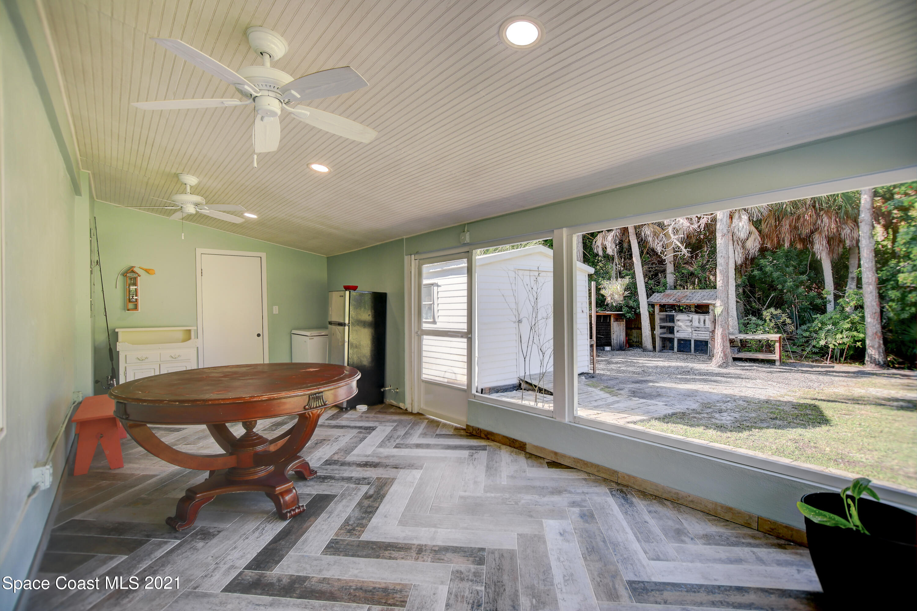 1896 Keewin Avenue Palm Bay, FL 32905 - Photo 21 of 23 a view of a livingroom with furniture window and outside view