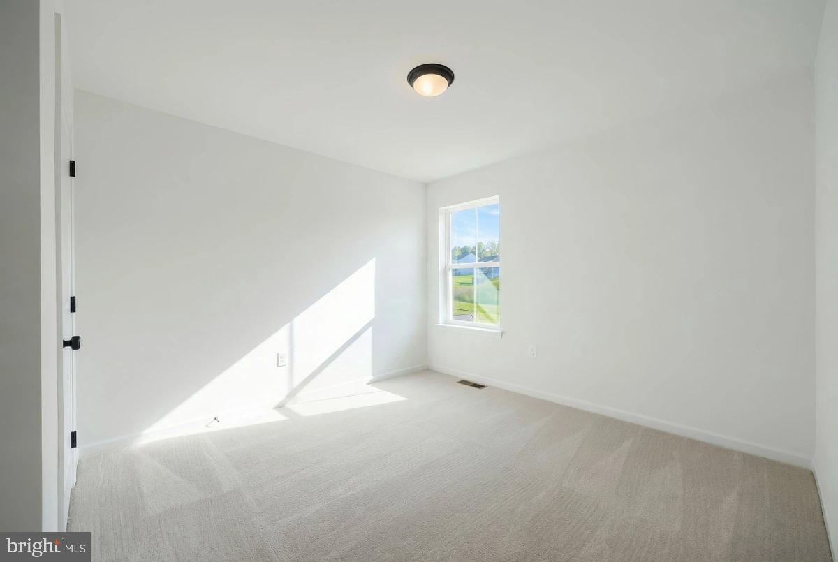 6324 Liam Drive Spring Grove, PA 17362 - Photo 23 of 38 a view of an empty room with a window