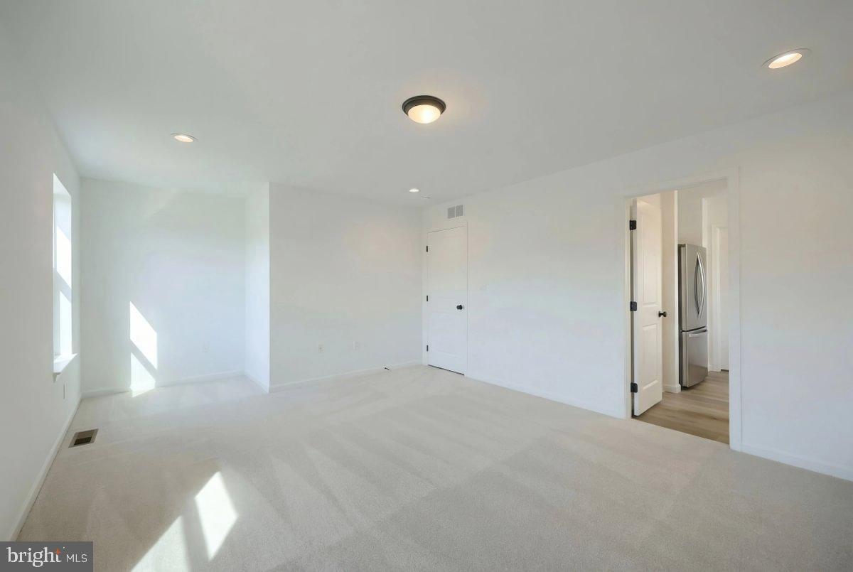 6324 Liam Drive Spring Grove, PA 17362 - Photo 25 of 38 an empty room with lamp fan and window