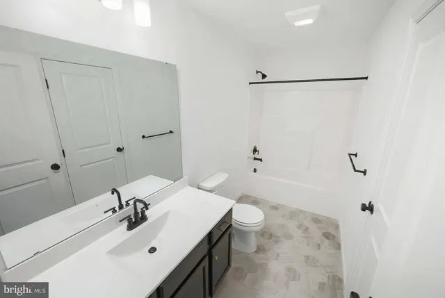 a sink with a mirror