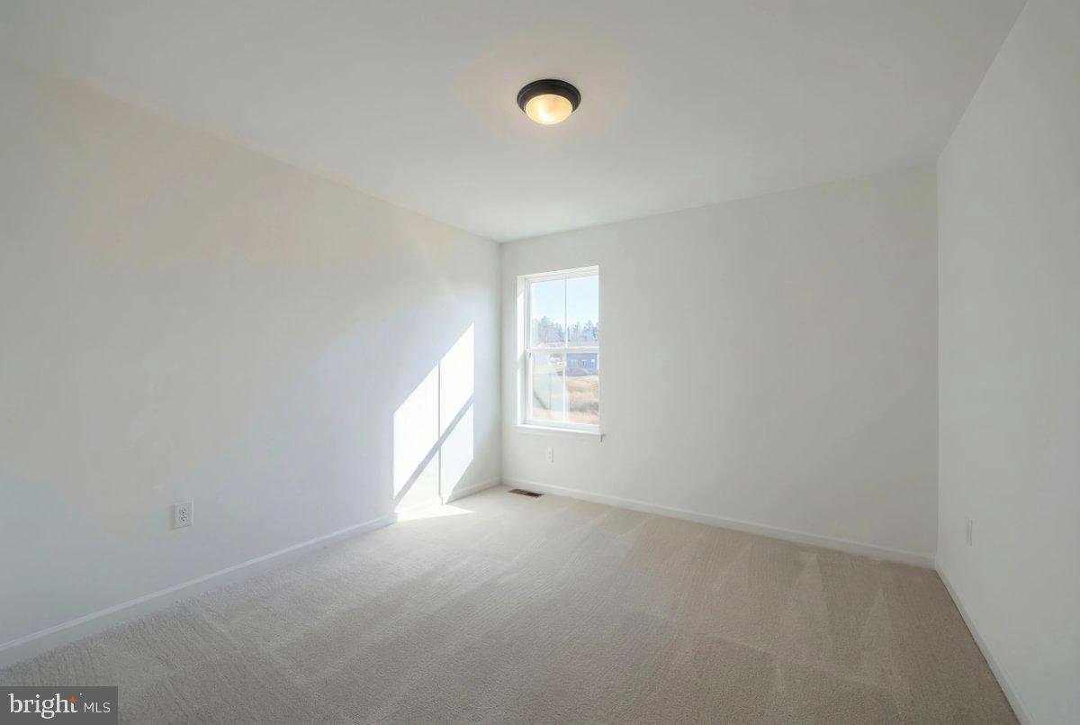 6324 Liam Drive Spring Grove, PA 17362 - Photo 36 of 38 a view of an empty room with a window