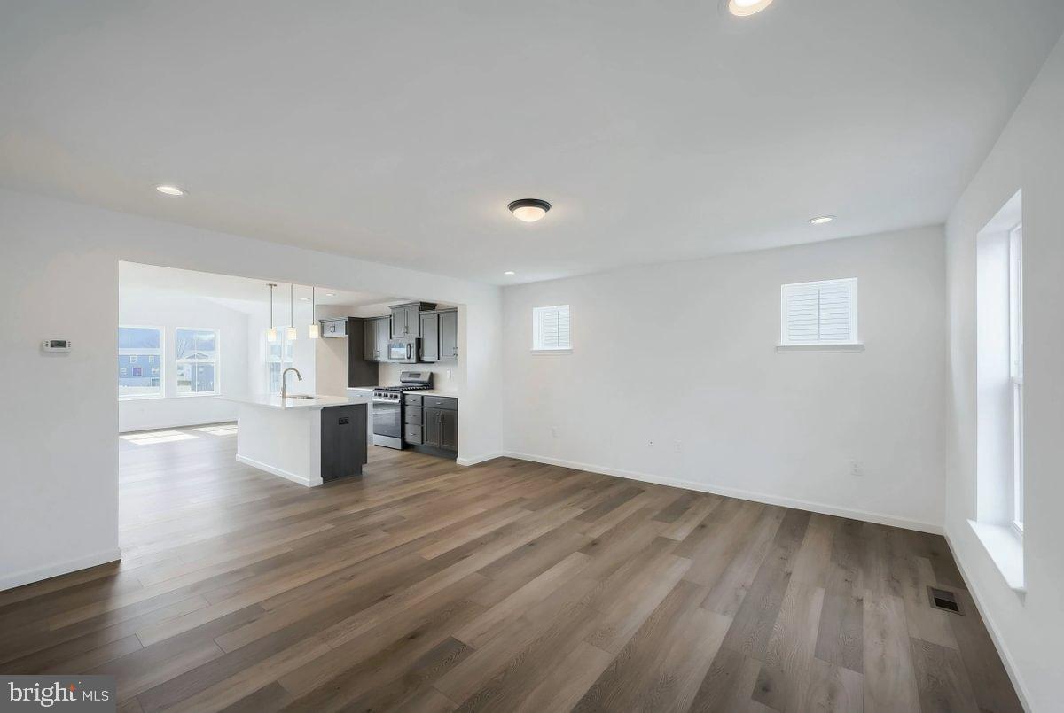 6324 Liam Drive Spring Grove, PA 17362 - Photo 7 of 38 a view of a kitchen with wooden floor