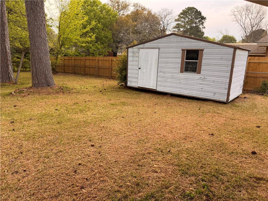 814 Avondale Road Montgomery, AL 36109 - Photo 10 of 10 View of shed featuring a fenced backyard