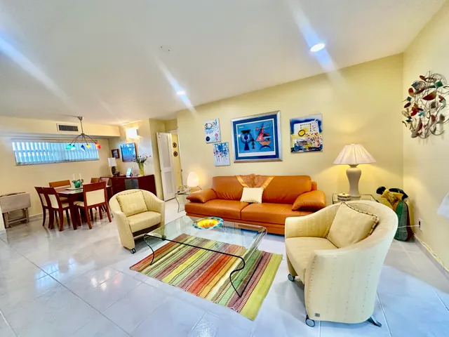 a living room with furniture and a couch