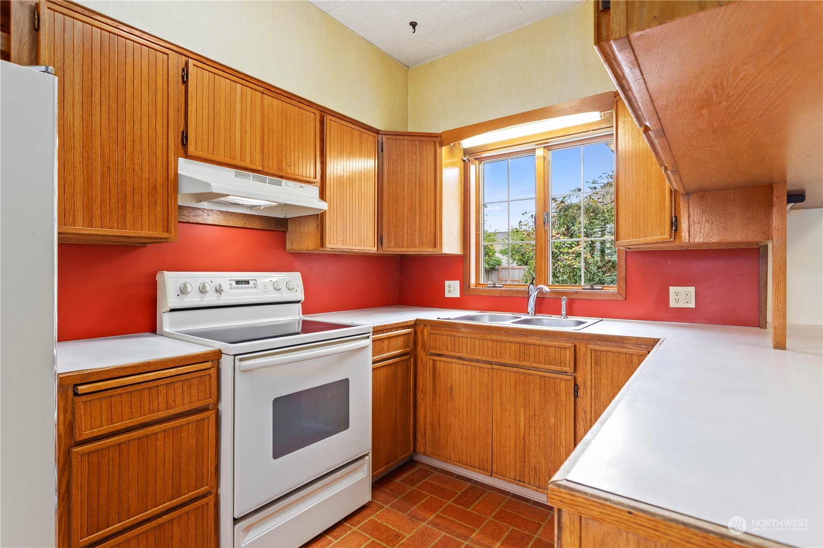 1809 Harris Avenue Bellingham, WA 98225 - Photo 12 of 27 a kitchen that has a sink and a stove