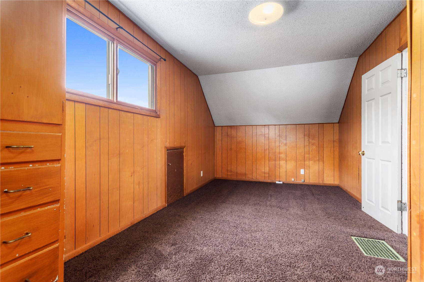 1809 Harris Avenue Bellingham, WA 98225 - Photo 22 of 27 a view of an empty room with a window