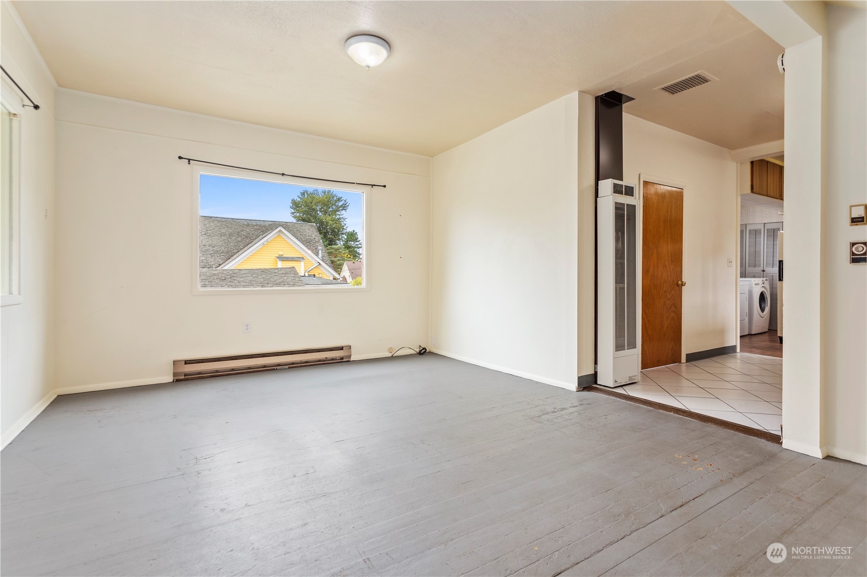 1809 Harris Avenue Bellingham, WA 98225 - Photo 5 of 27 an empty room with a empty space and windows