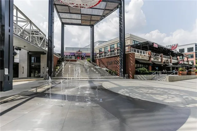 a view of a building with a street