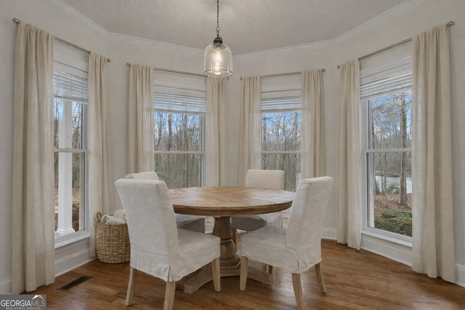 155 Rising Star Road Fayetteville, GA 30215 - Photo 29 of 89 a view of a dining room with furniture window and wooden floor